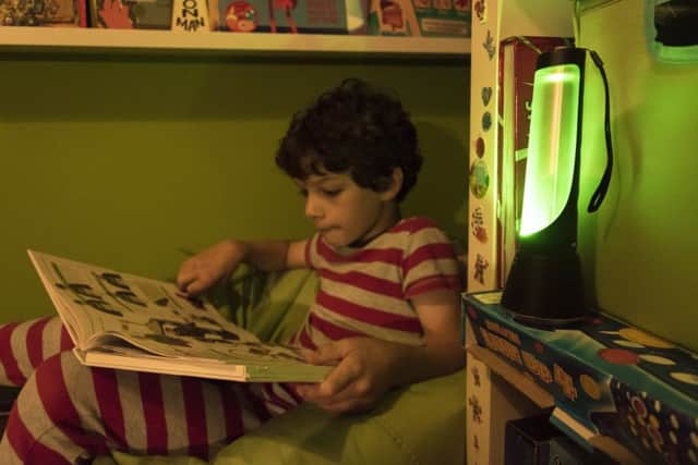 The Adaptalux Glow can be used as a night light for reading and can change colour.