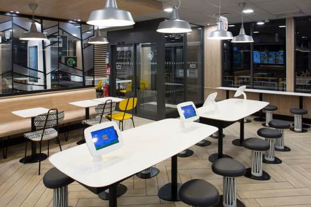 Tablets are among the new features coming to McDonald's, in Boston.
