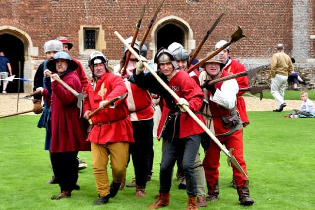 Re-enactors gettng ready for battle at last years event