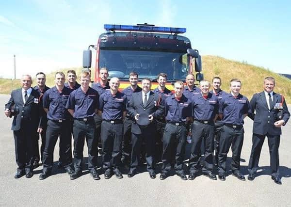 Passing out: A number of new firefighters on parade, including one from Mablethorpe .