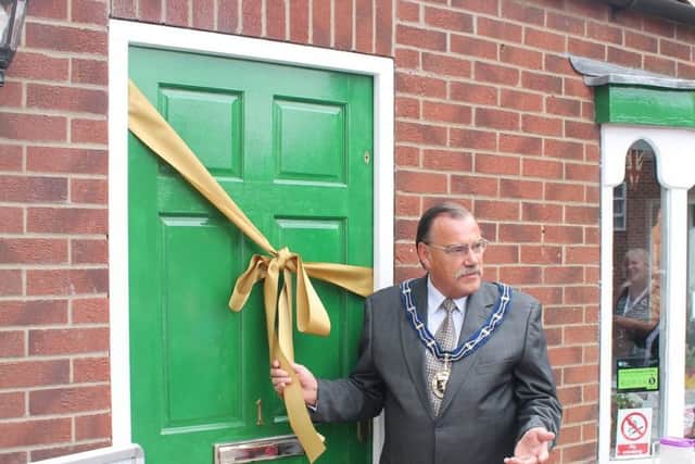 The Mayor of Louth, Councillor George Horton, outside the Crispy Biscuit.