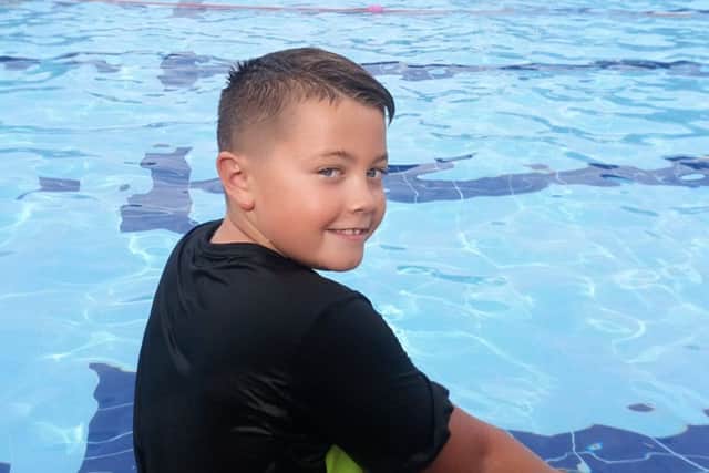 Champion fundraiser Andrew Short at the Jubilee Park pool. Photo: John Fieldhouse.