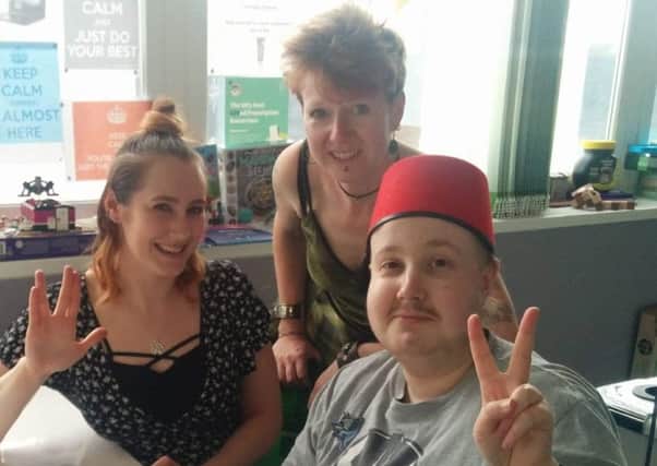 Connor with nurse Lizzy and his mum Verity at Nottingham Hospital. EMN-180718-131115001
