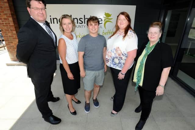 Leo Scott Smith (centre) with officials who are backing his venture