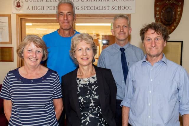 The five long-serving staff members who have retired from QEGS. Photo: John Aron
