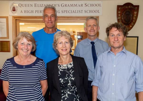 The five long-serving staff members who have retired from QEGS. Photo: John Aron