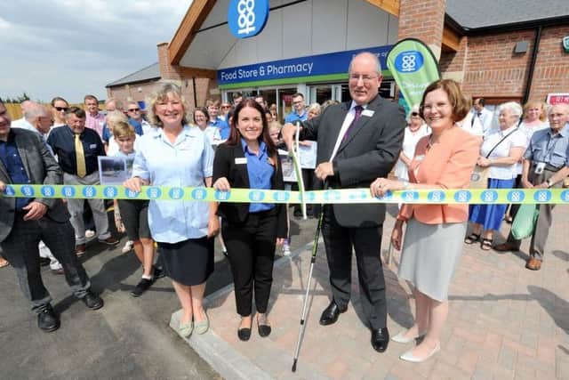 Cutting the ribbon at the new £1.6m Lincolnshire Co-op outlet in Swineshead.