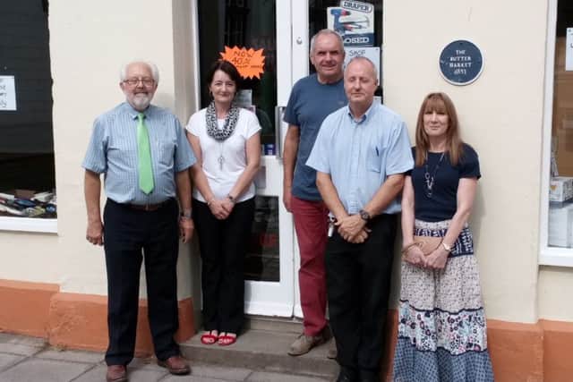 Keith and David are pictured above with other staff members Michael Edwards, Karen Watts and Carol Cox.