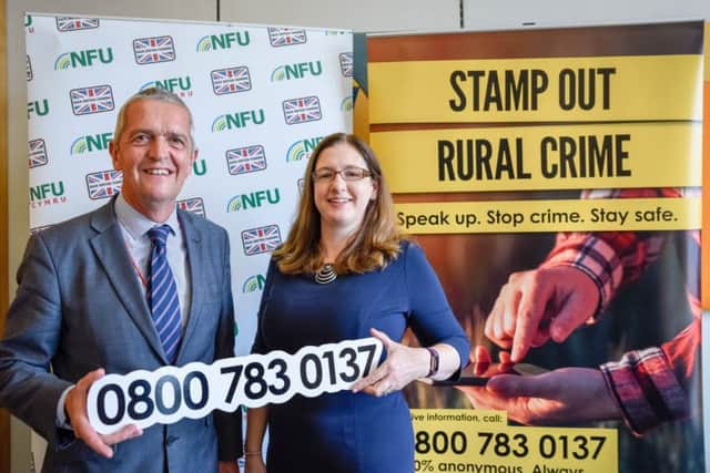 MP Dr Caroline Johnson with NFU Deputy President Guy Smith at the rural crime line launch event. EMN-180720-165615001