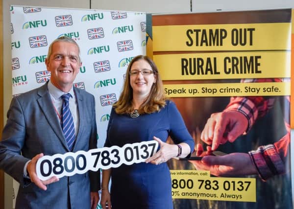 MP Dr Caroline Johnson with NFU Deputy President Guy Smith at the rural crime line launch event. EMN-180720-165615001