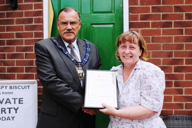 Mayor of Louth, Councillor George Horton, with Crispy Biscuit owner Susan Turbitt-Mawby.