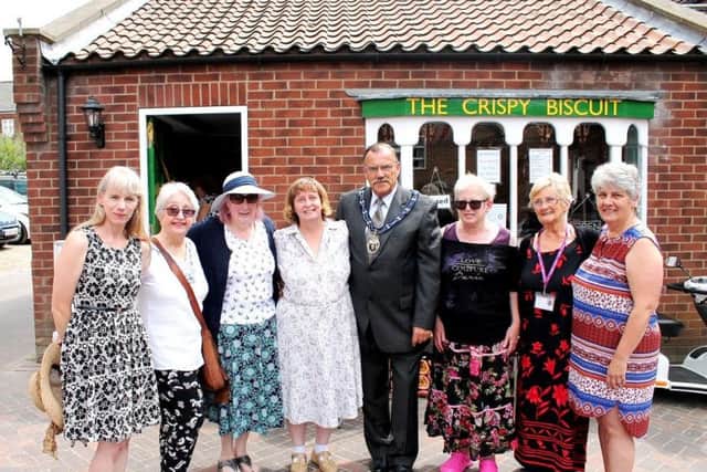 The Mayor of Louth, Councillor George Horton, with Crispy Biscuit owner Susan Turbitt-Mawby and members of the new Louth Friendship Group.