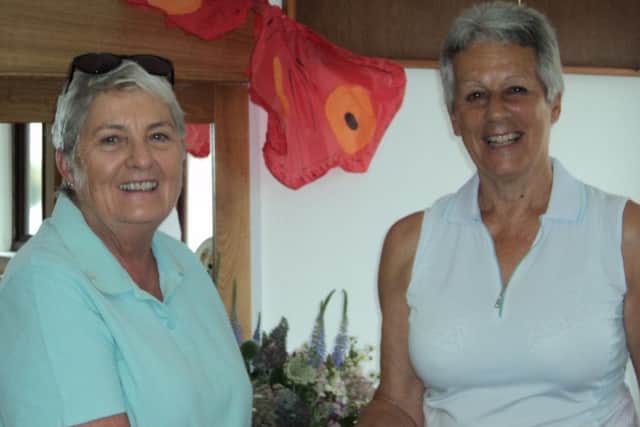 Captain's day winner Sharman Scott with lady captain Jenny Holborn EMN-180723-160811002
