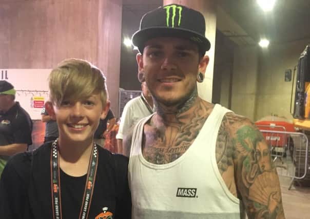 Mickie with Tai Woffinden.
