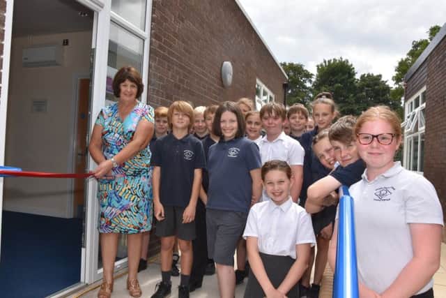 Coun Patricia Bradwell with pupils from Wragby Primary School opening the new classroom facility. Picture: John Edwards.