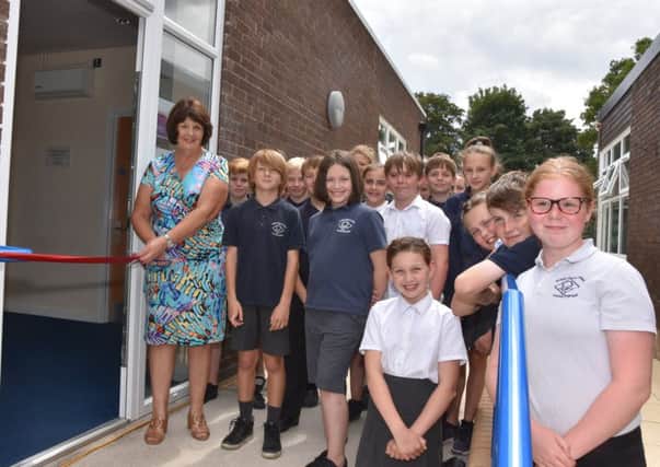 Coun Patricia Bradwell with pupils from Wragby Primary School opening the new classroom facility. Picture: John Edwards.
