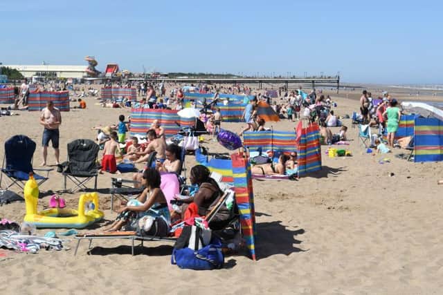Crowds enjoy the hot weather at the beach. Photo for illustration only.