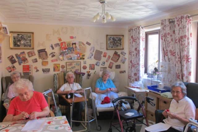 Residents at Greenacres care home in Heckington produced 950 poppies towards the Heckington 100 project, which has just reached 10,000 hand made poppies created for its display.