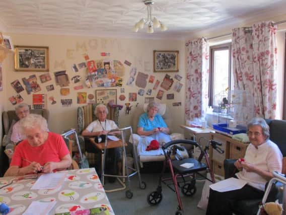 Residents at Greenacres care home in Heckington produced 950 poppies towards the Heckington 100 project, which has just reached 10,000 hand made poppies created for its display.