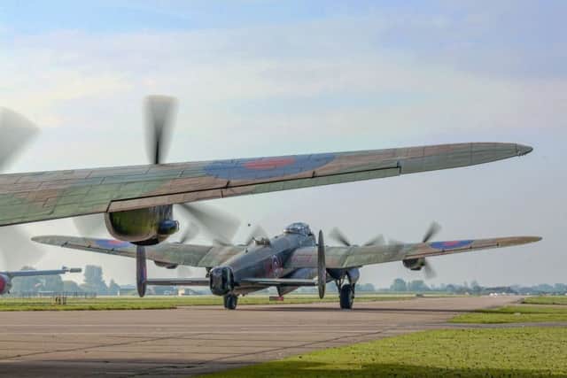 The Canadian Lancaster Vera sets out to taxy for the final time to RAF Coningsbys runway, about to be followed by the BBMF Lancaster Thumper. Photo by Oscarpix Imaging. EMN-180730-114906001
