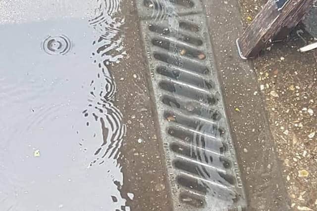 A flooded drain in Roman Bank, Skegness. Photo: Barry Robinson. ANL-180728-084327001