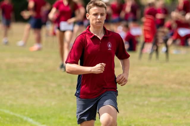 Harry Atfield, Year 10, competing in the 200m race. EMN-180730-145754001