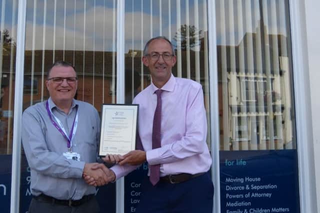 Wilkin Chapman Partner Rupert Houltby (right) receives the award and certificate from T.E.D Programme Manager, Guy Dewsbury.
