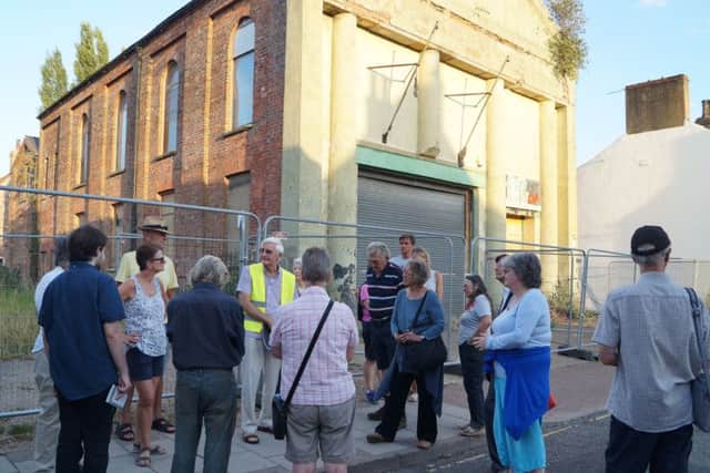 Mal Jones talks about some of the town's history, including this piece, which is due to be demolished in the very near future EMN-180308-062343001