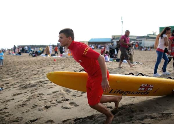 Young Lifeguard Janusz Burda, pictured in action. Photo: RNLI