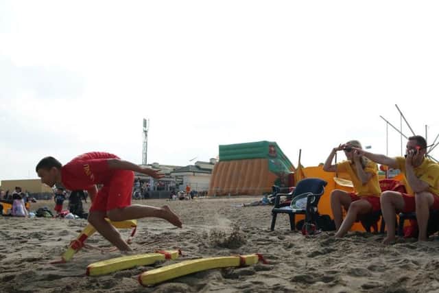 Lifeguard Janusz Burda, left, pictured during a training session. Photo: RNLI.