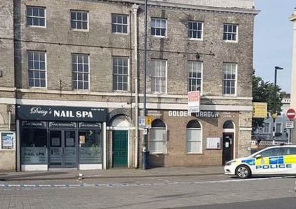 Part of Boston Market Place has been cordoned off following a stabbing. Photo submitted. ANL-180608-102027001
