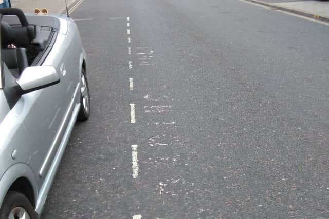 The road markings are also near enough unreadable.