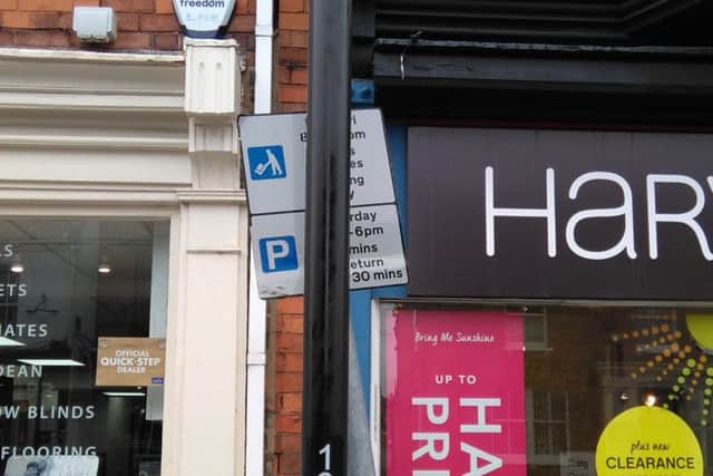 Main photo: How Mr Hancock saw the parking sign head on, (with most of the wording hidden behind another post).