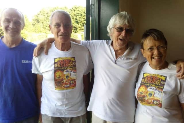 All smiles... t-shirts were printed with details about the beer and cider fundraising festival.