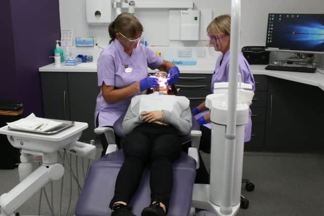 Just some of the members from Broadbank Dental in the new treatment room.