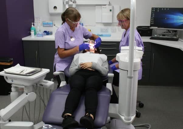 Just some of the members from Broadbank Dental in the new treatment room.