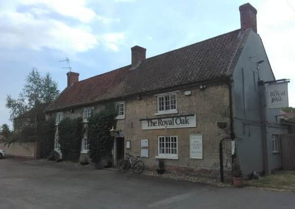 The Grade II-listed Royal Oak pub in Scopwick is up for sale.
