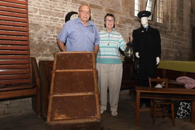 Helpringham Feast. L-R Terry and Pat Markham with transport memorabilia. EMN-180813-110120001
