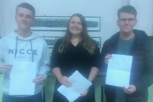 Bradley Walker, head of Government and Politics Laura Harvey, and Thomas Tuplin at Skegness Grammar School. ANL-180816-085753001