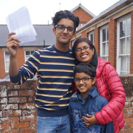 Caistor Grammar School: Rohan Samuel celebrated his results with his mum and younger brother. Rohan will be going to Warwick University to study Computer Science. EMN-180816-093657001