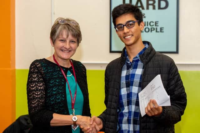 Head boy Karan Gupta is pictured with Headteacher Heather Payne. Karan got 4A* and will be heading to Cambridge Trinity College to study medicine.