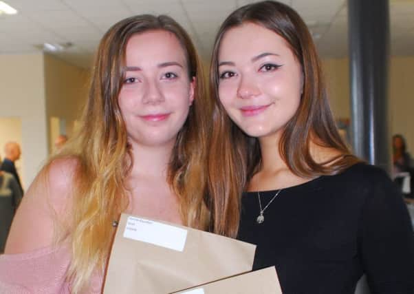 Harriet Baumber and Francesca Winfield of Sleaford were both successful in getting their grades at St George's Academy. Harriet got A and 2 Bs to study geography at Leeds University and become a data analyst in the Armed Forces, while Francesca got a B and 2 Cs to do English and creative writing at Leeds Becket University and hopes to work in marketing. EMN-180816-101712001