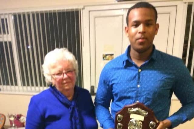 Jabari Darrell picks up the Ben Williams Individual Performance of the Season prize at last season's Market Rasen CC awards EMN-180816-110509002