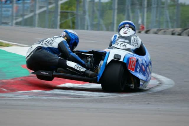 Passenger Jev Walmsley goes airborne in a tight turn EMN-180816-120638002