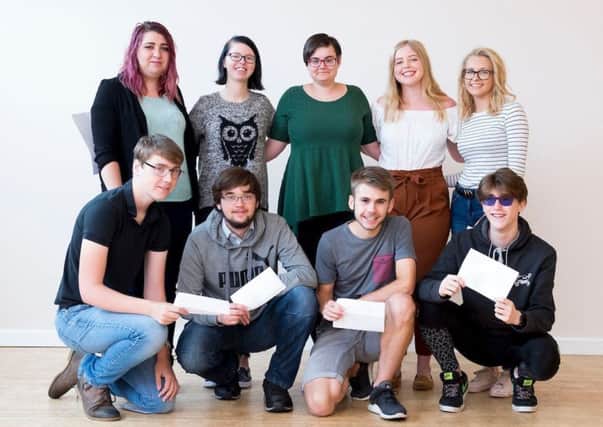 Some of the proud Louth Academy and Cordeaux Academy students with their results. (Picture: Sean Spencer).