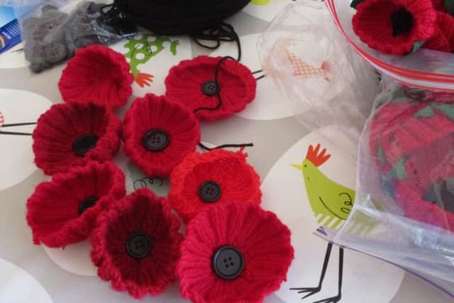 Examples of some of the handmade poppies.