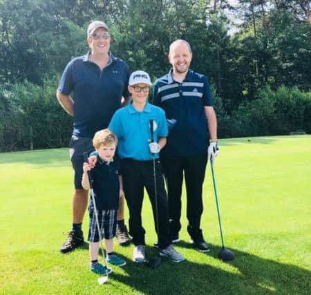 Front Niall and Will, pictured with Will's dad Phil King (back left) and Niall's dad (back right) Pete McMorrow. EMN-180820-113829001