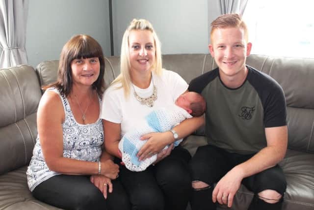 Proud mum Kayleigh Templeton and baby Jacob Noah, with her husband Rob Templeton and her mother Ann Tilling.