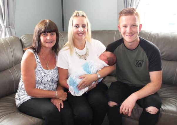 Proud mum Kayleigh Templeton and baby Jacob Noah, with her husband Rob Templeton and her mother Ann Tilling.
