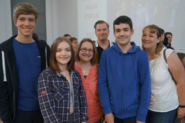 De Aston head teacher Simon Porter celebrates with students William Furminger, Rosie Smith (and her mum) and Joshua Wright (and his mum).
Rosie is heading to the Emile Dale Academy in Hitchin to study musical theatre, Joshua is headng to the Grimsby Institute for a course in Video Games and William will be staying at De Aston to study A-levels. EMN-180823-110529001
